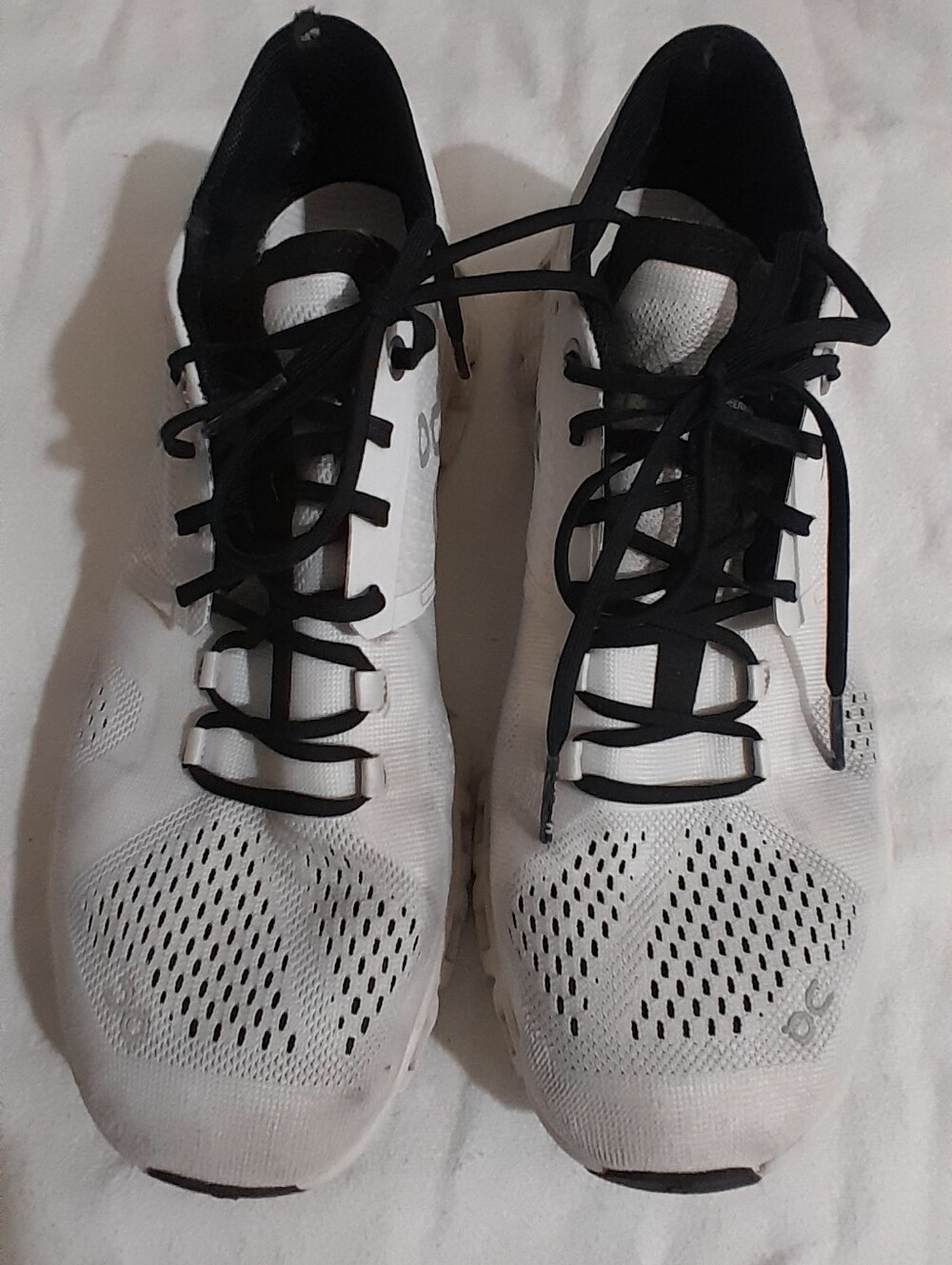 White Athletic Running Shoes with Black Accents